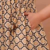 Premium cream feeding kurti featuring functional side pocket and soft rayon fabric.