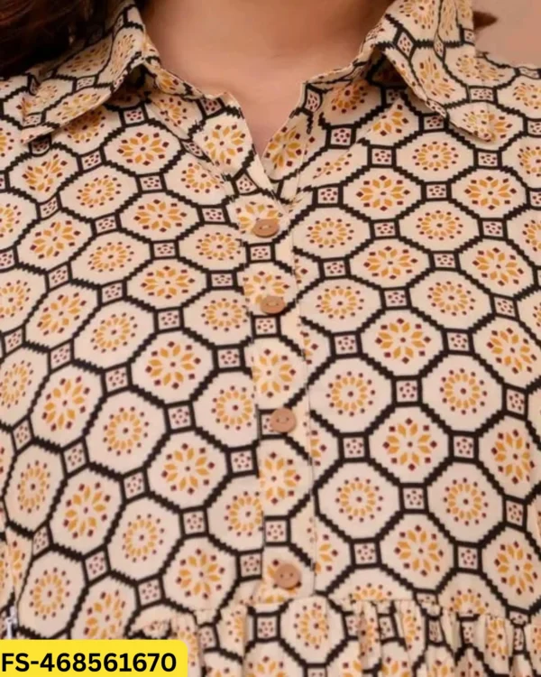 Close-up of premium cream feeding kurti featuring shirt collar and printed rayon fabric.