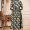 Back view of green floral cotton feeding kurti with adjustable waist tie and comfortable fit.