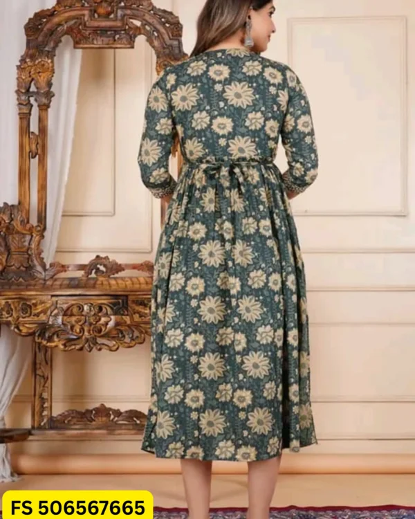Back view of green floral cotton feeding kurti with adjustable waist tie and comfortable fit.