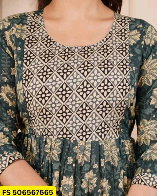 Front close-up of green floral cotton feeding kurti with geometric printed yoke and hidden nursing zip.