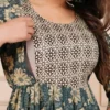 Graceful green cotton feeding kurti with hidden nursing zip, floral print and three-quarter sleeves for breastfeeding mothers.